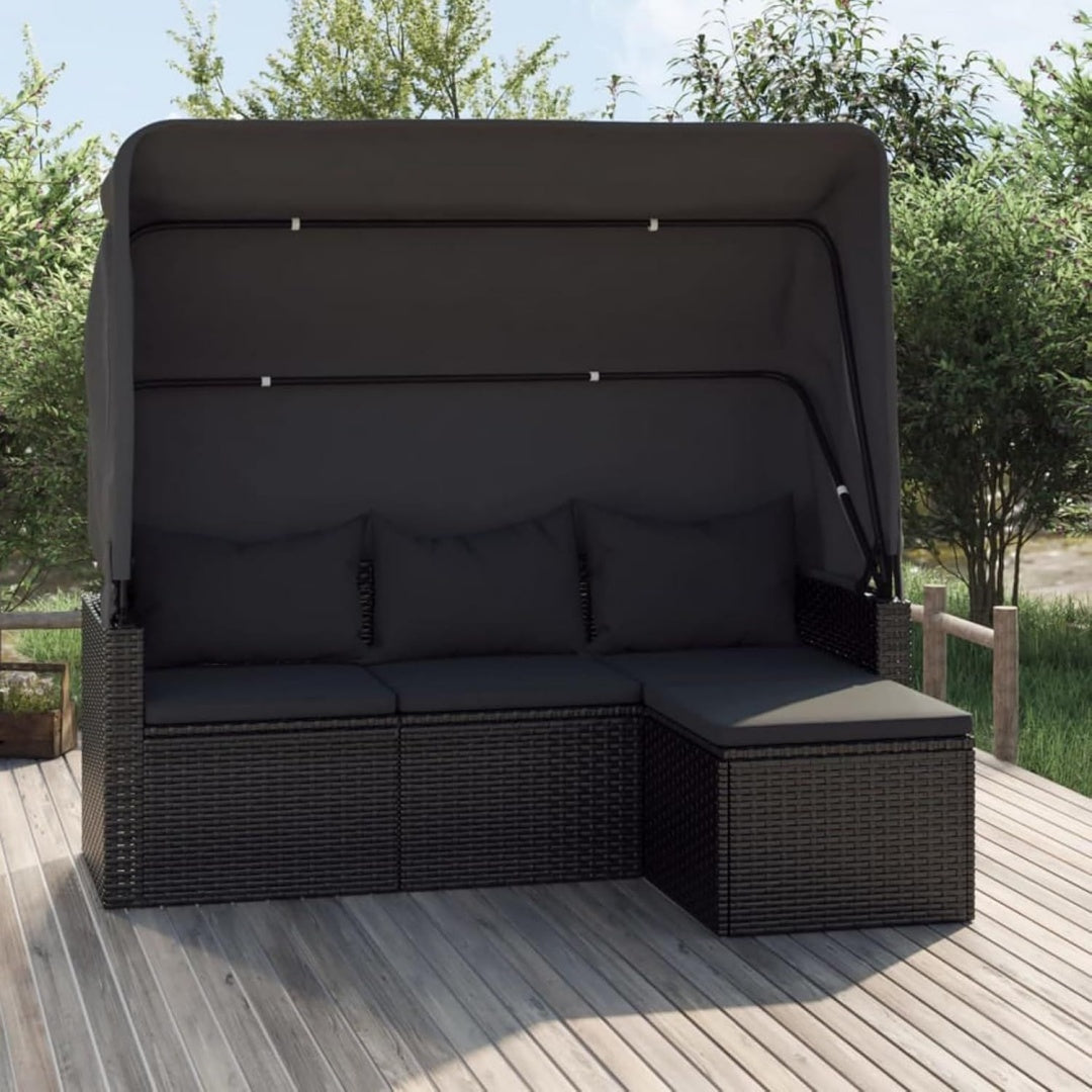 Sofa mit Flechtoptik und einer Fussauflage